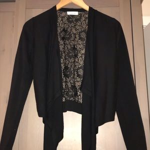 Calvin Klein black shrug with lace back.